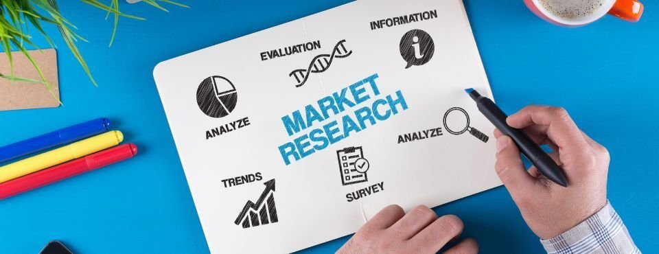 Junk hauling business market research: hand sketching a market research diagram with analysis, trends and survey icons