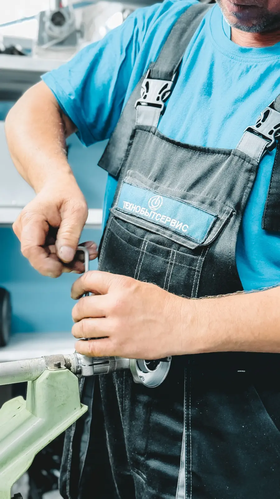 Plumber tightening a pipe fitting with a wrench Local Services Ads management: plumber tightening a pipe fitting with a wrench